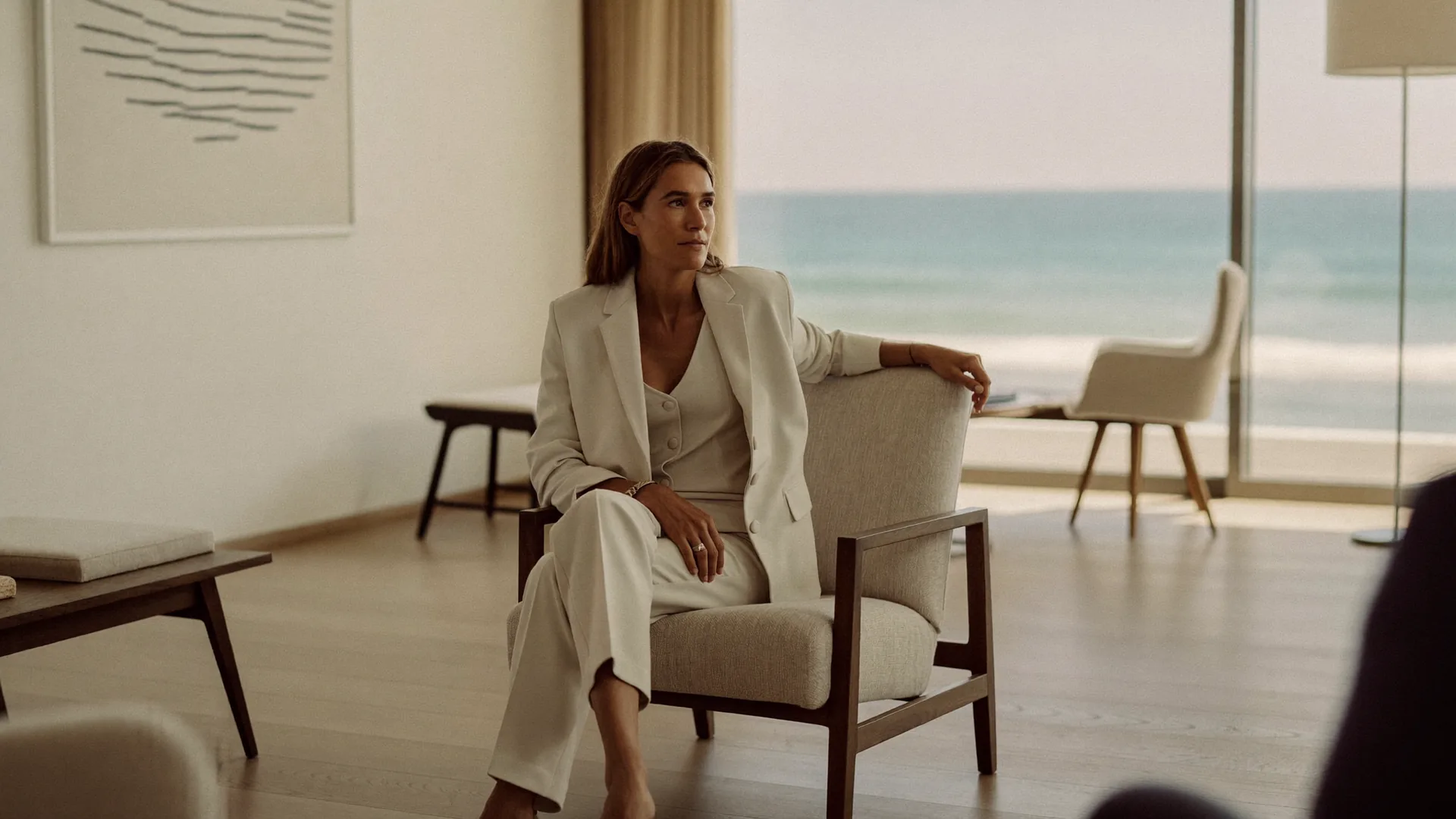 Woman discussing thigh lift surgery options during a consultation in Newport Beach.